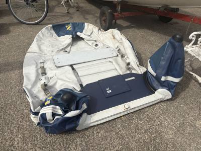 ZODIAC INFLATABLE BOAT (NEEDS 3 BUNGS) 