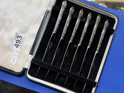 SET OF SILVER HANDLED KNIVES