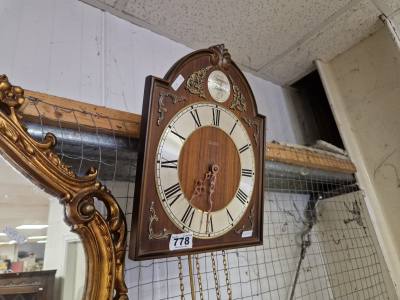 WEIGHTED WALL CLOCK