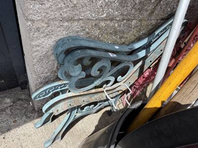 PAIR OF CAST SEAT ENDS