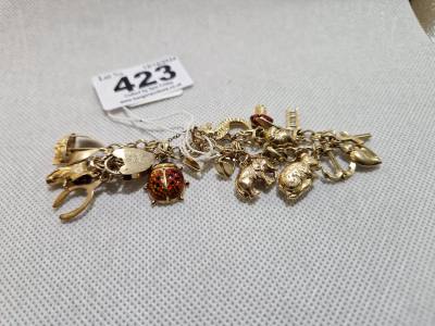 9CT GOLD CHARM BRACELET