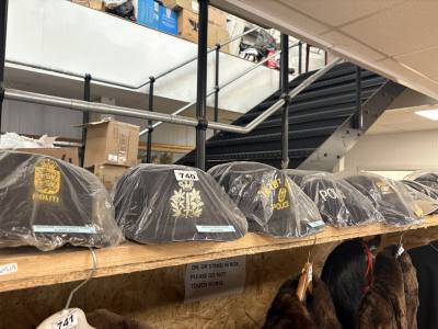 COLLECTION OF 10 MIXED REGION POLICE HATS