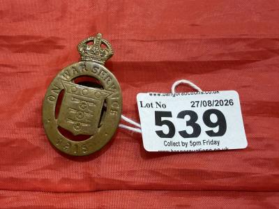 ON WAR SERVICE 1915 BADGE