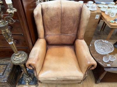 DISTRESSED LEATHER WINGBACK CHAIR