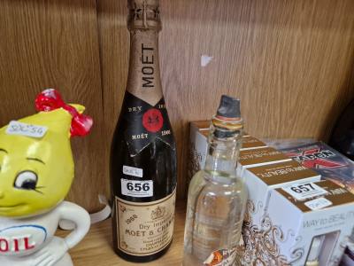 BOTTLE OF SODA WATER + MOET CHANDON