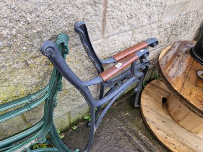 PAIR OF CAST SEAT ENDS