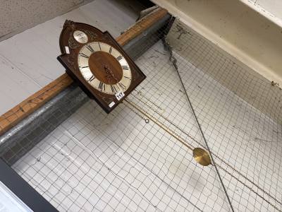 WEIGHTED WALL CLOCK