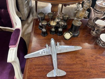 LOT OF GOLF, FOOTBALL TROPHIES + CHROME AIRPLANE ETC