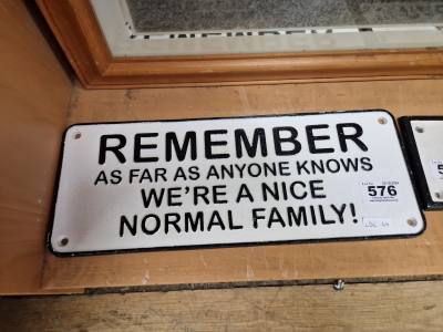 SLOGAN SIGN