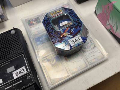 POKEMON BINDER + TIN OF CARDS