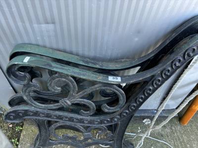 PAIR OF CAST SEAT ENDS