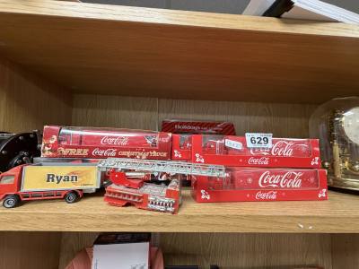 LOT OF COLLECTORS COCA COLA TRUCKS