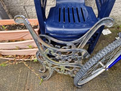 PAIR OF CAST SEAT ENDS