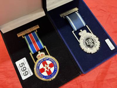 2 X CASED MEDALS