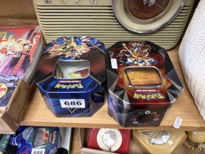 2 X TUBS OF POKEMON CARDS
