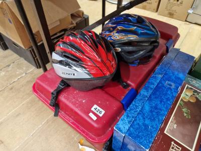BOX OF CYCLING HELMETS