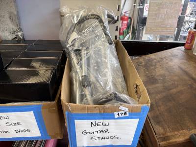 BOX OF GUITAR STANDS