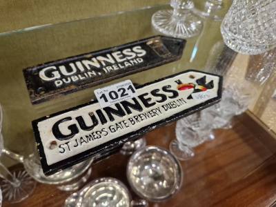 PAIR OF CAST GUINNESS SIGNS
