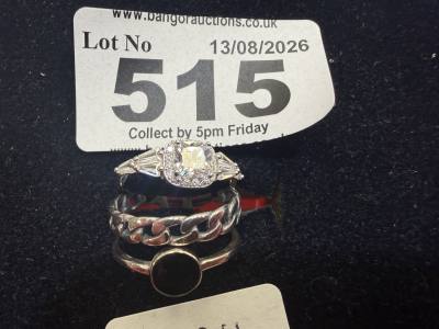 2 X SILVER DRESS RINGS