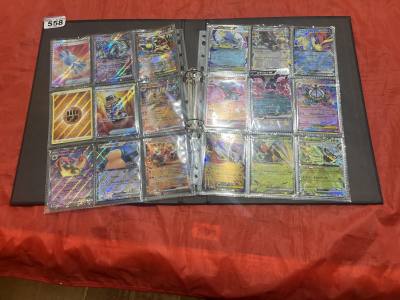 POKEMON CARDS IN AN ALBUM