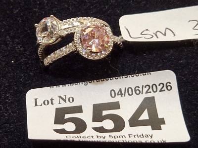 2 X SILVER DRESS RINGS
