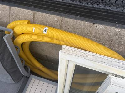 ROLL OF PLASTIC PIPE
