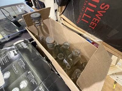 BOX OF GLASS BOTTLES