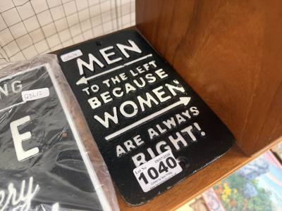 MEN TO THE LEFT SIGN