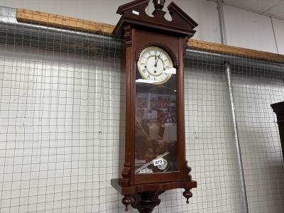 WEIGHTED WALL CLOCK
