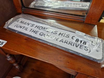 MAN'S HOME SIGN