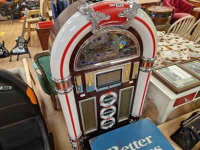NOVELTY JUKEBOX + REMOTE IN OFFICE