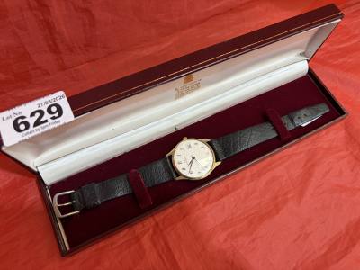 9CT GENTS GARRARD 17 JEWEL WATCH