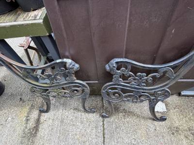 PAIR OF CAST SEAT ENDS