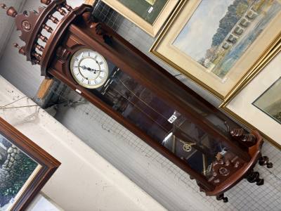 WEIGHTED WALL CLOCK