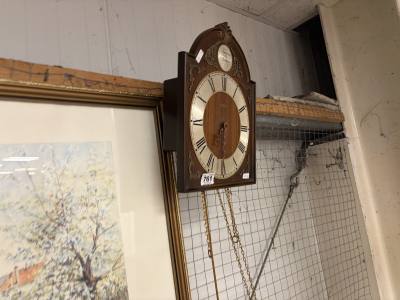WEIGHTED WALL CLOCK