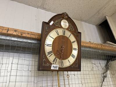 WEIGHTED WALL CLOCK