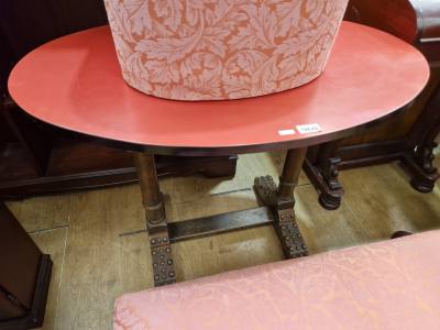 STUDDED FOOT OVAL TABLE