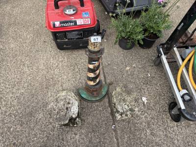 PAIR OF STONE ORNAMENTS + LIGHTHOUSE