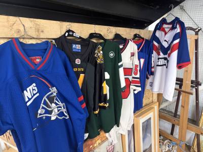 LOT OF AMERICAN FOOTBALL JERSEYS (ONE SIGNED)