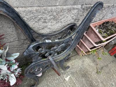 PAIR OF CAST SEAT ENDS