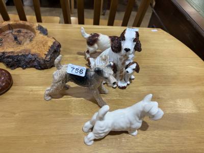 4 X CERAMIC DOG ORNAMENTS 