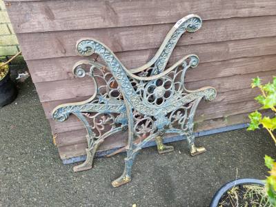 PAIR OF CAST SEAT ENDS