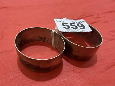 PAIR OF ARABIC SILVER NAPKIN RINGS (32.8 GRAMS)